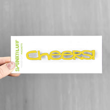 Load image into Gallery viewer, Spunky Fluff Proudly handmade in South Dakota, USA Yellow Cheers-Tiny Word Magnet