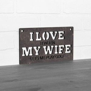 Spunky Fluff Proudly handmade in South Dakota, USA Small / Weathered Ebony "I Love It When My Wife Lets Me Play Golf" Decorative Wall Sign