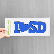 Load image into Gallery viewer, Spunky Fluff Proudly handmade in South Dakota, USA Cobalt State Initials Tiny Word Magnet
