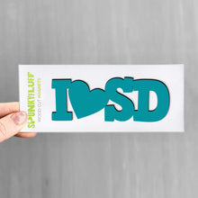 Load image into Gallery viewer, Spunky Fluff Proudly handmade in South Dakota, USA Teal State Initials Tiny Word Magnet
