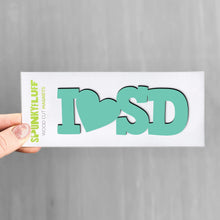 Load image into Gallery viewer, Spunky Fluff Proudly handmade in South Dakota, USA Turquoise State Initials Tiny Word Magnet