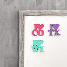 Load image into Gallery viewer, Spunky Fluff Proudly handmade in South Dakota, USA Magenta State Pride Initials Magnet
