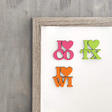 Load image into Gallery viewer, Spunky Fluff Proudly handmade in South Dakota, USA Orange State Pride Initials Magnet