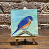 Blue Feathered Artwork & Easel