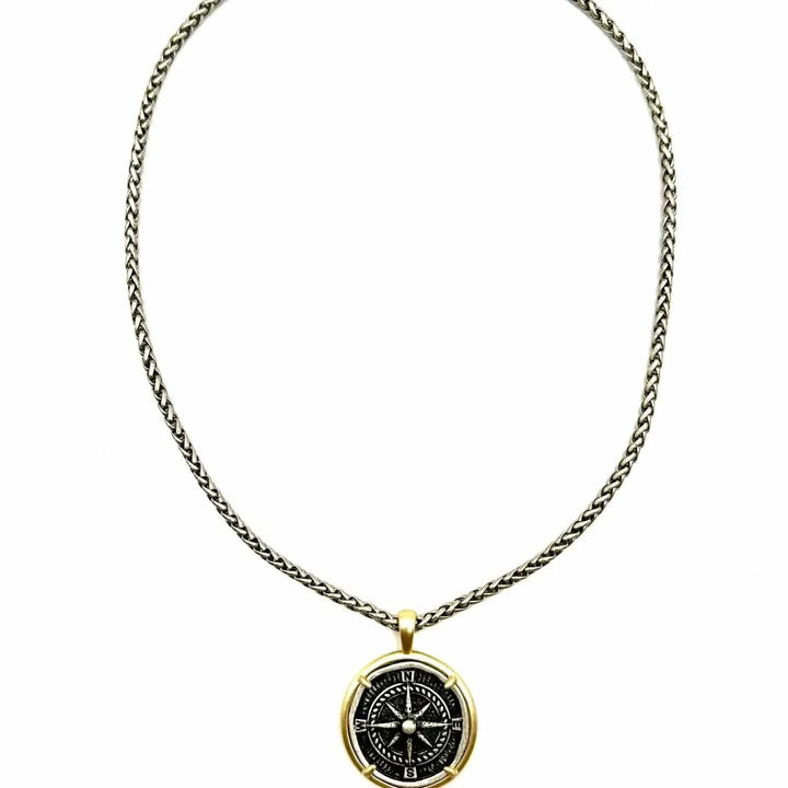 LJ Sonder Compass Pendant Necklace showing bezel-set compass pendant and silver chain
