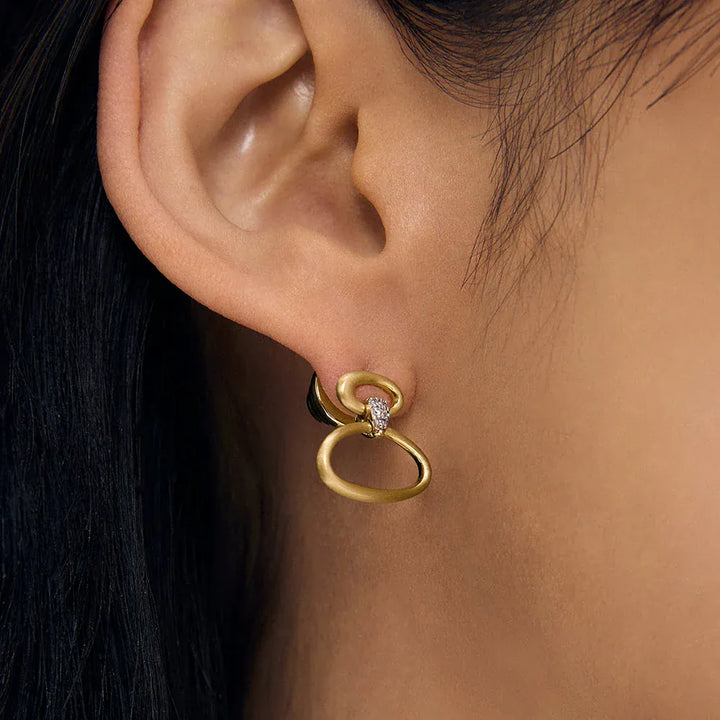 Dean Davidson Celeste Droplet Earrings in gold shown on model