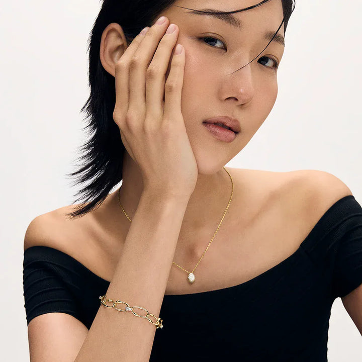 Dean Davidson Celeste Link Bracelet in gold shown on model