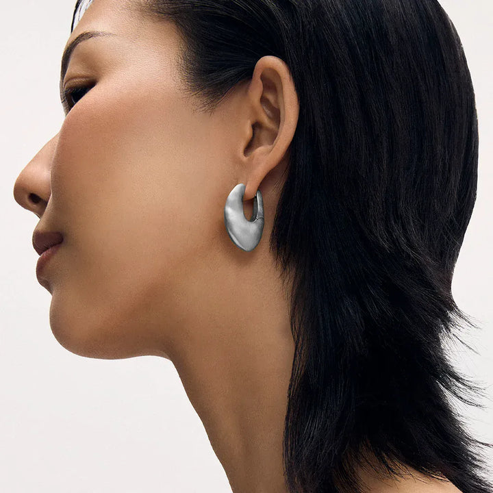 Dean Davidson Serra Hinged Hoops in silver, worn