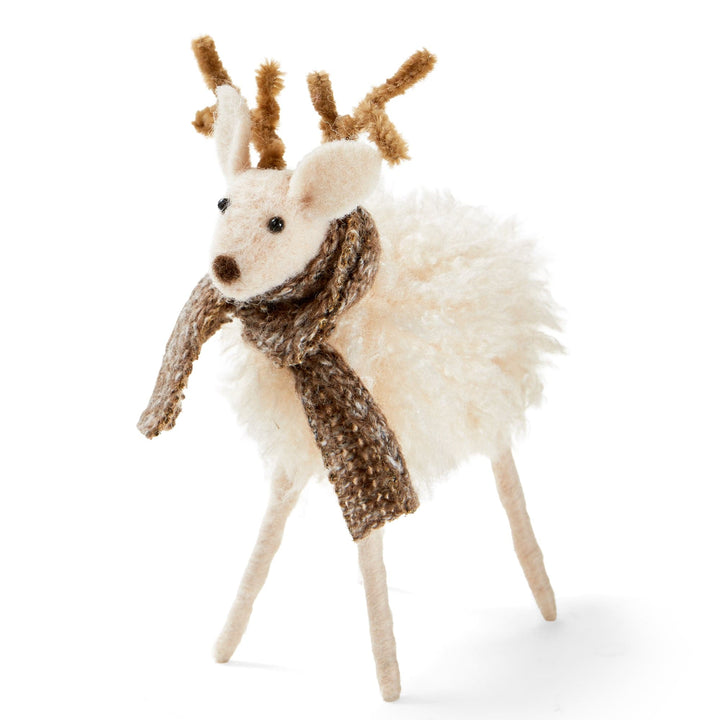 Small white wool reindeer figurine wearing a knit winter scarf