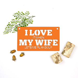 Spunky Fluff Proudly handmade in South Dakota, USA Small / Orange "I Love It When My Wife Lets Me Play Golf" Decorative Wall Sign