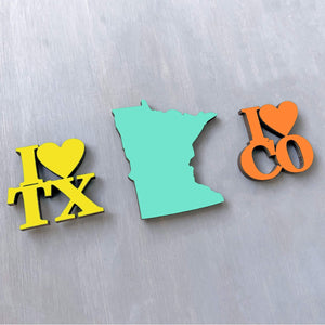 Spunky Fluff Proudly handmade in South Dakota, USA Yellow State Shape Pride Magnets